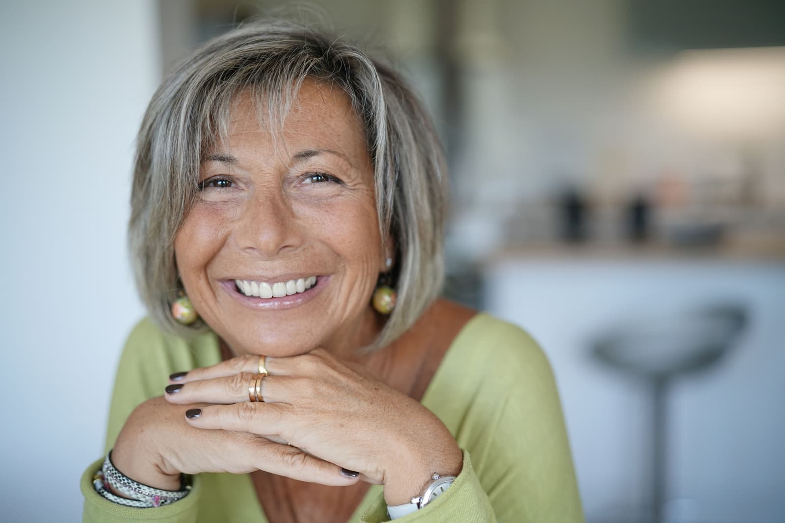 Smiling senior woman at home