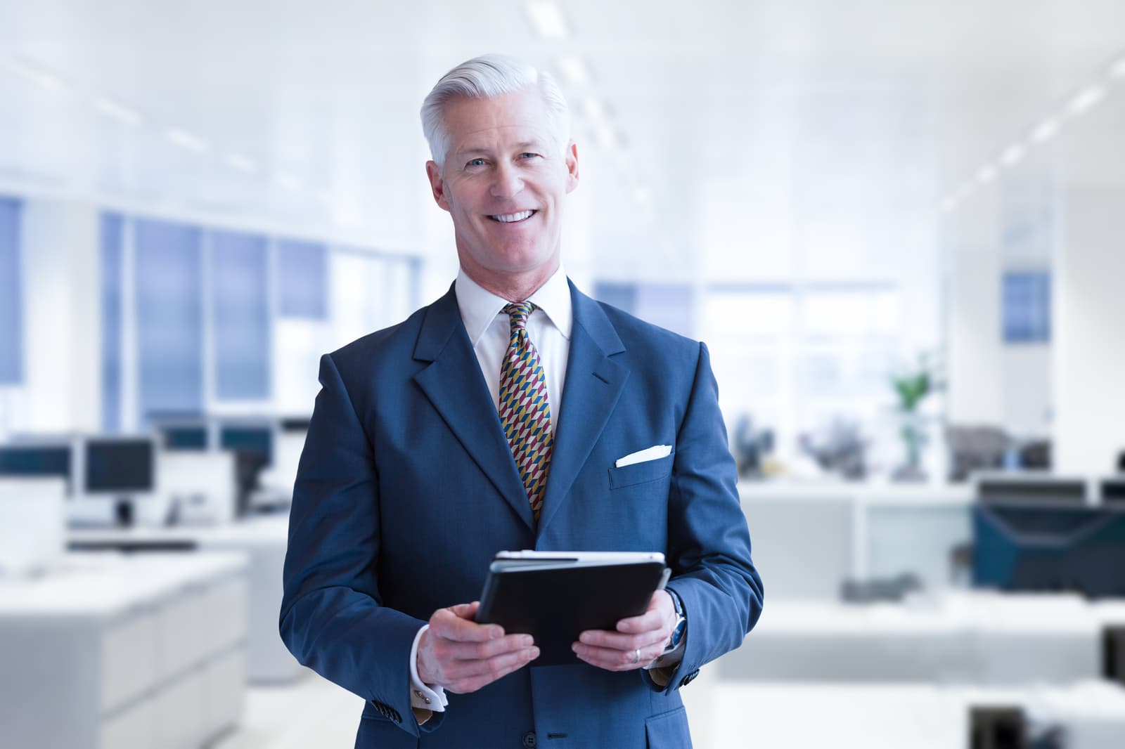 Senior businessman in his office